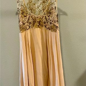 Size Medium 100% silk special occasion dress and L embroidered jacket. Worn once